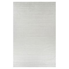 Rug & Kilim’s Oversized Textural Rug In Solid White, Gray and Cream Striae
