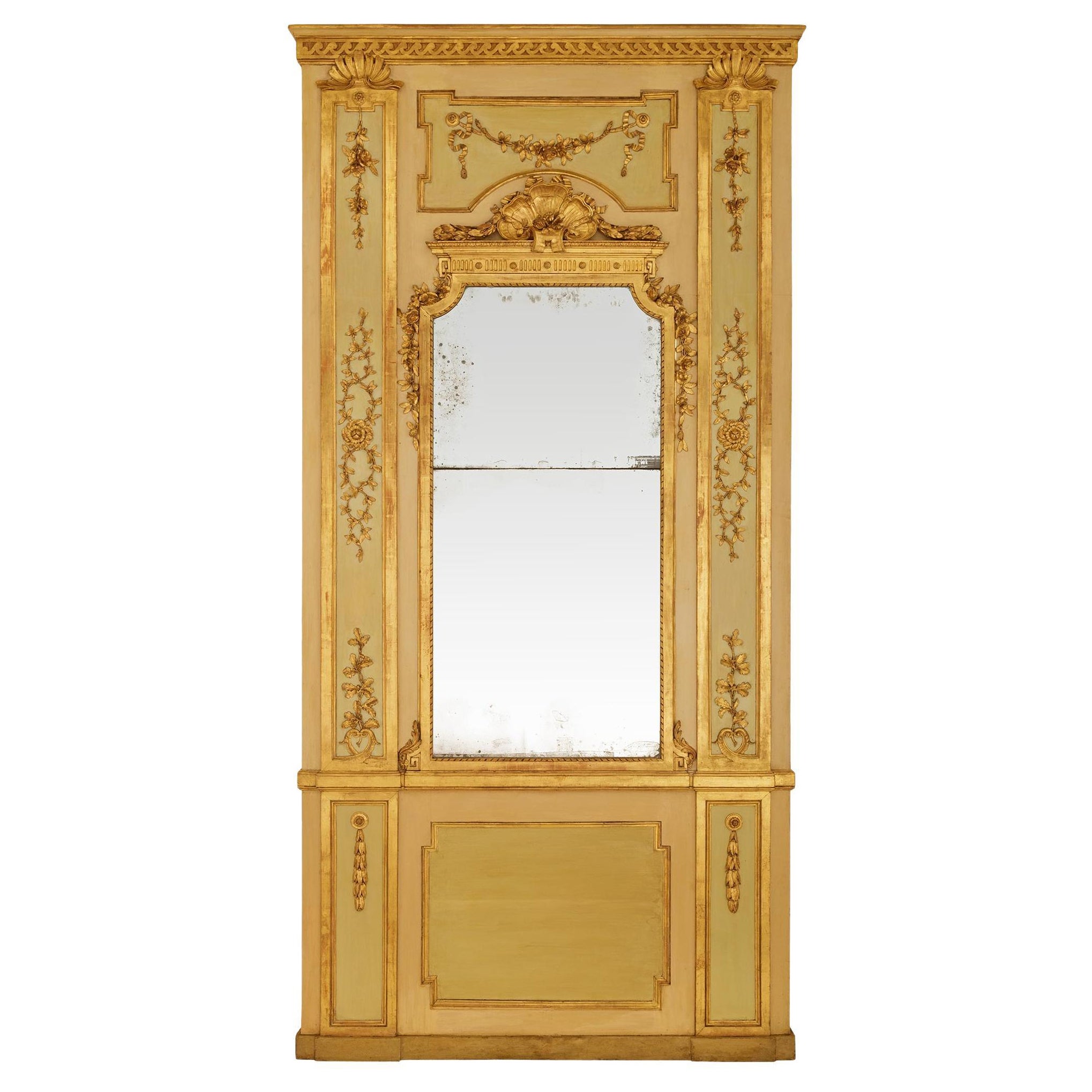 Italian 18th century Louis XVI Period patinated Wood and Giltwood trumeau mirror