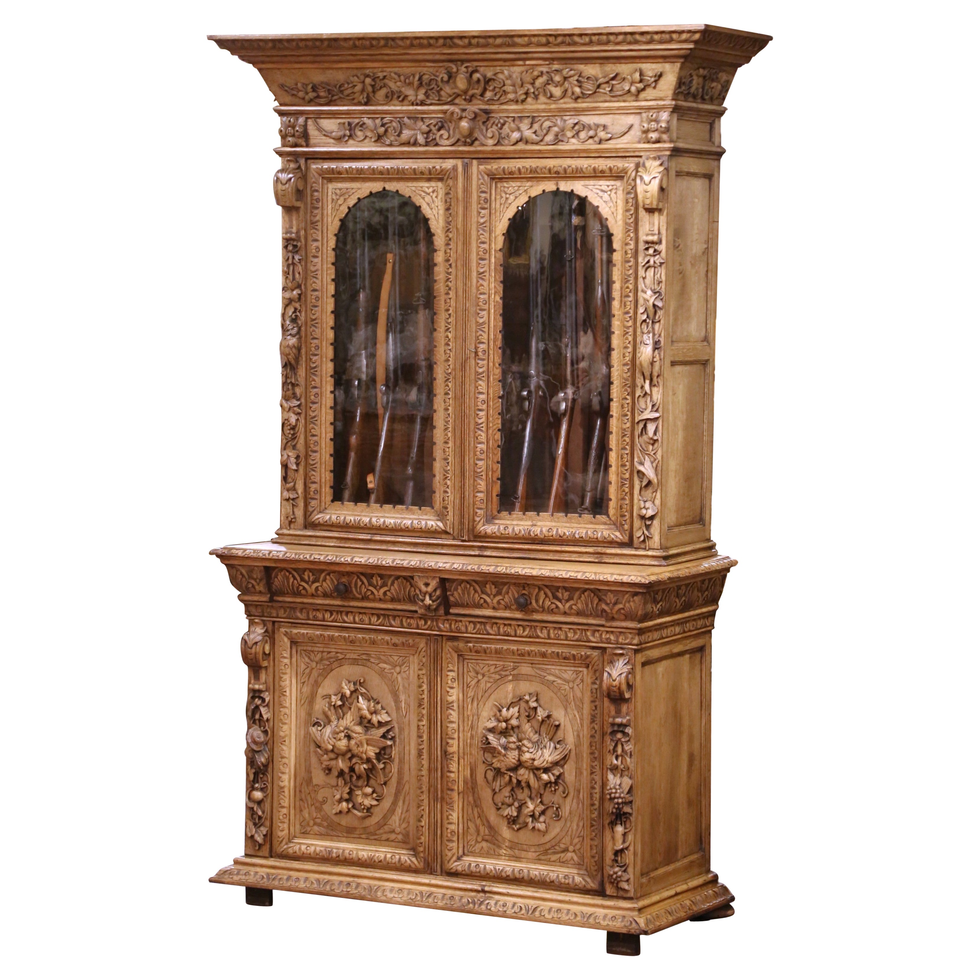 19th Century French Carved Oak Nine-Gun Cabinet with Bird and hunt Motifs