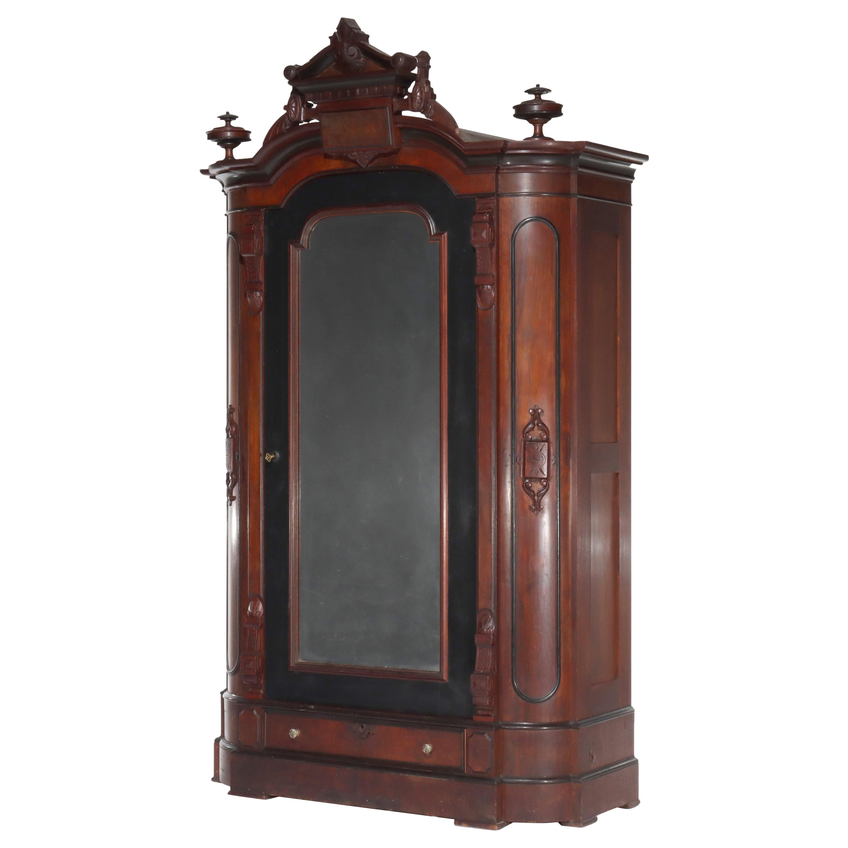 Armoire oversize rinascimentale in mogano ebanizzato parziale con medaglioni