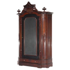 Armoire oversize rinascimentale in mogano ebanizzato parziale con medaglioni