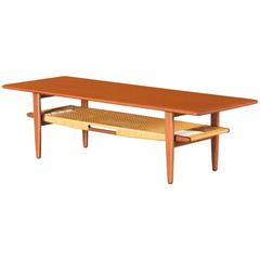 Danish Modern Coffee Table with Caned Shelf by Gunnar Schwartz