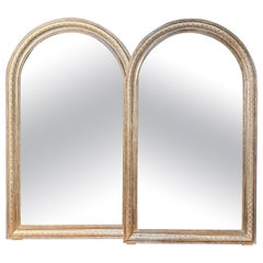 Magnifique paire de miroirs Louis Philippe argentés avec plateau en arc de cercle