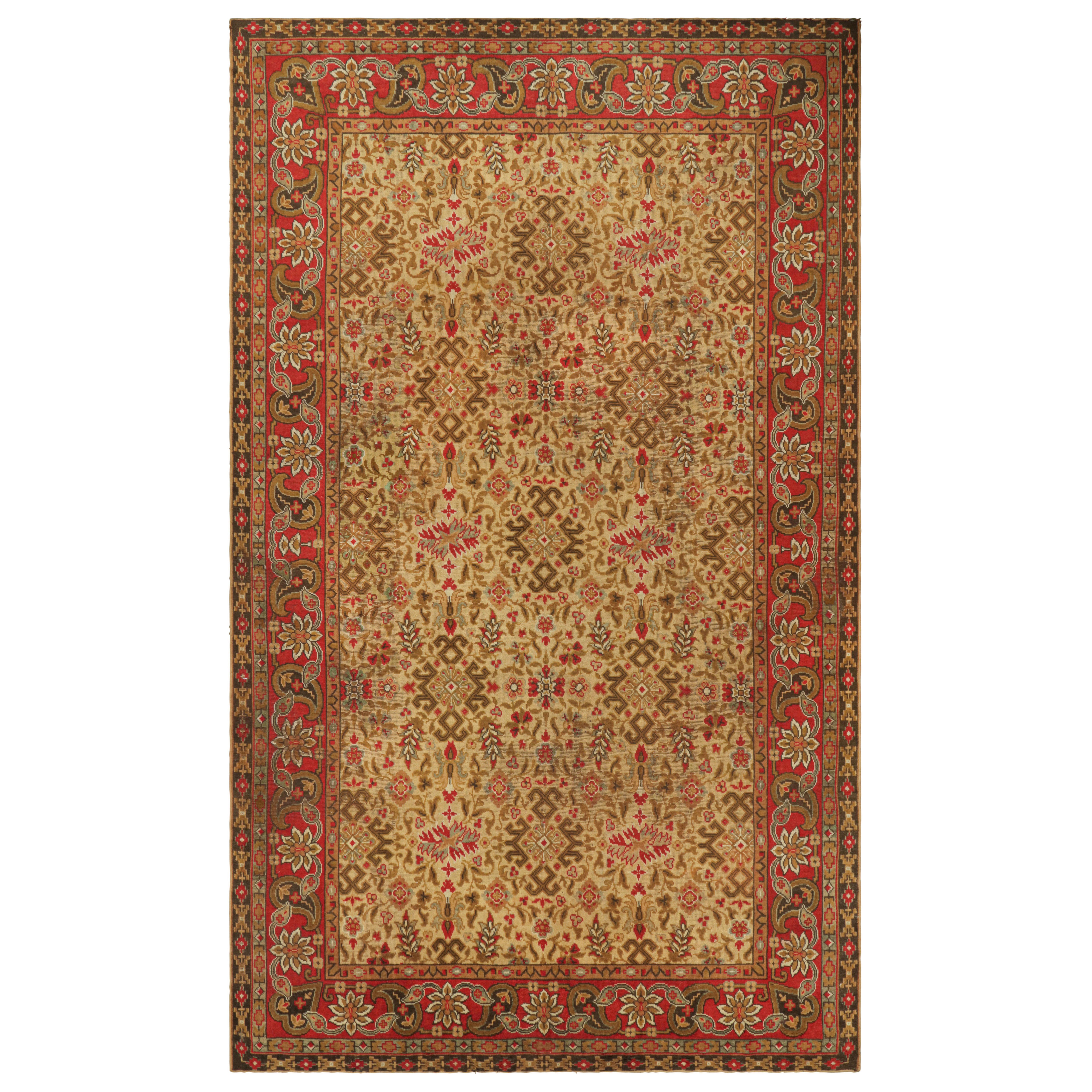 Tappeto Donegal vintage oversize in oro e rosso con motivi floreali - Rug & Kilim