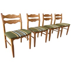 Set of Four Danish Modern Henning Kjærnulf Oak Dining Chairs