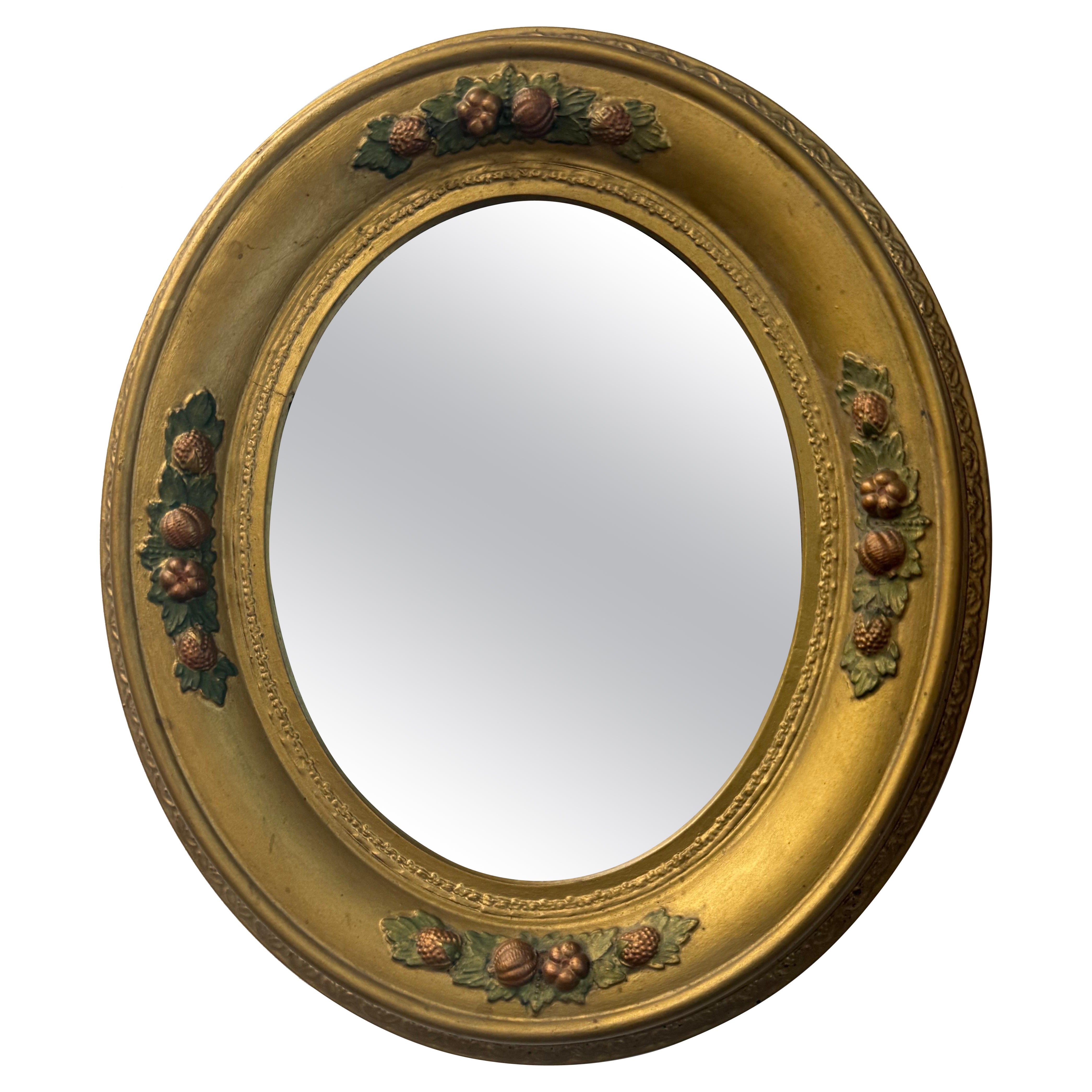 Victorian-Era Gilt Wood Framed Oval Mirror With Polychrome Floral Detail