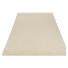 Alfombra contemporánea de Rug & Kilim en tonos sólidos beige-marrón