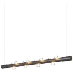 Lampada a sospensione contemporanea Lucy Small Linear in alluminio anodizzato nero di JSPR