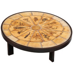 Roger Capron Tavolino ovale con impronte di fauna in ceramica e Wood