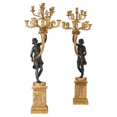 Paire de candélabres français en bronze doré et bronze patiné