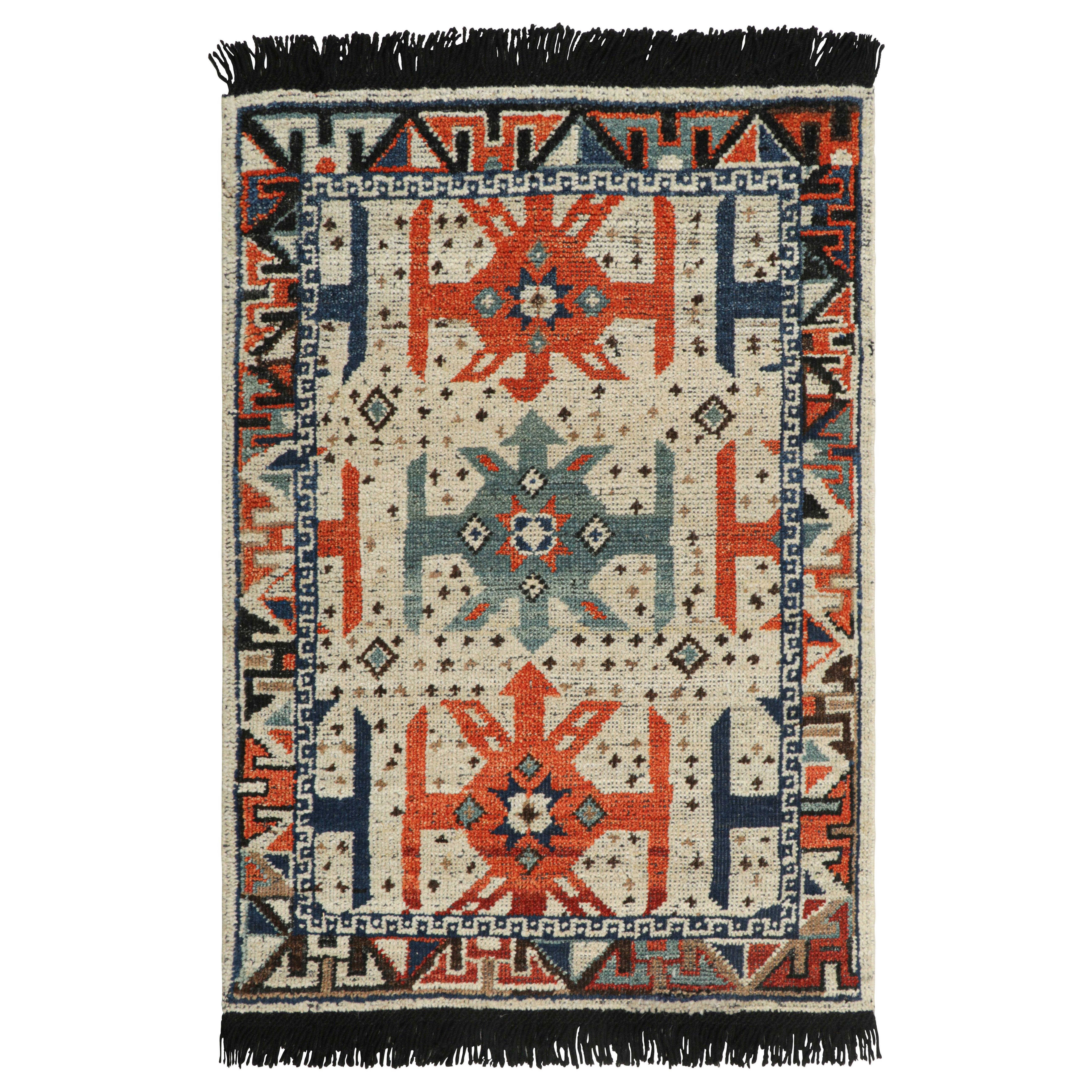 Rug & Kilim’s Tribal Custom Rug Sample with Orange and Blue Geometric Patterns