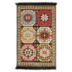 Rug & Kilim’s Tribal Custom Rug Sample with Medallions and Geometric Patterns