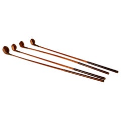 Juego de cuatro palos de golf vintage, circa 1930-1940