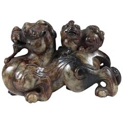 Chinese Archaistic Brown Jade Carving of a Bixie and Young