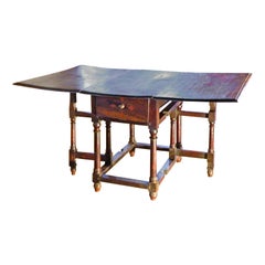 French 17th Century Louis XIII Walnut and inlaid Drop-Leaf Table