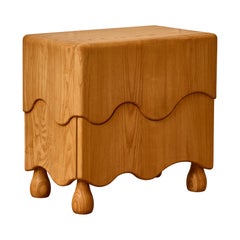 "Molten" night stand in carved wood by Studio Glustin