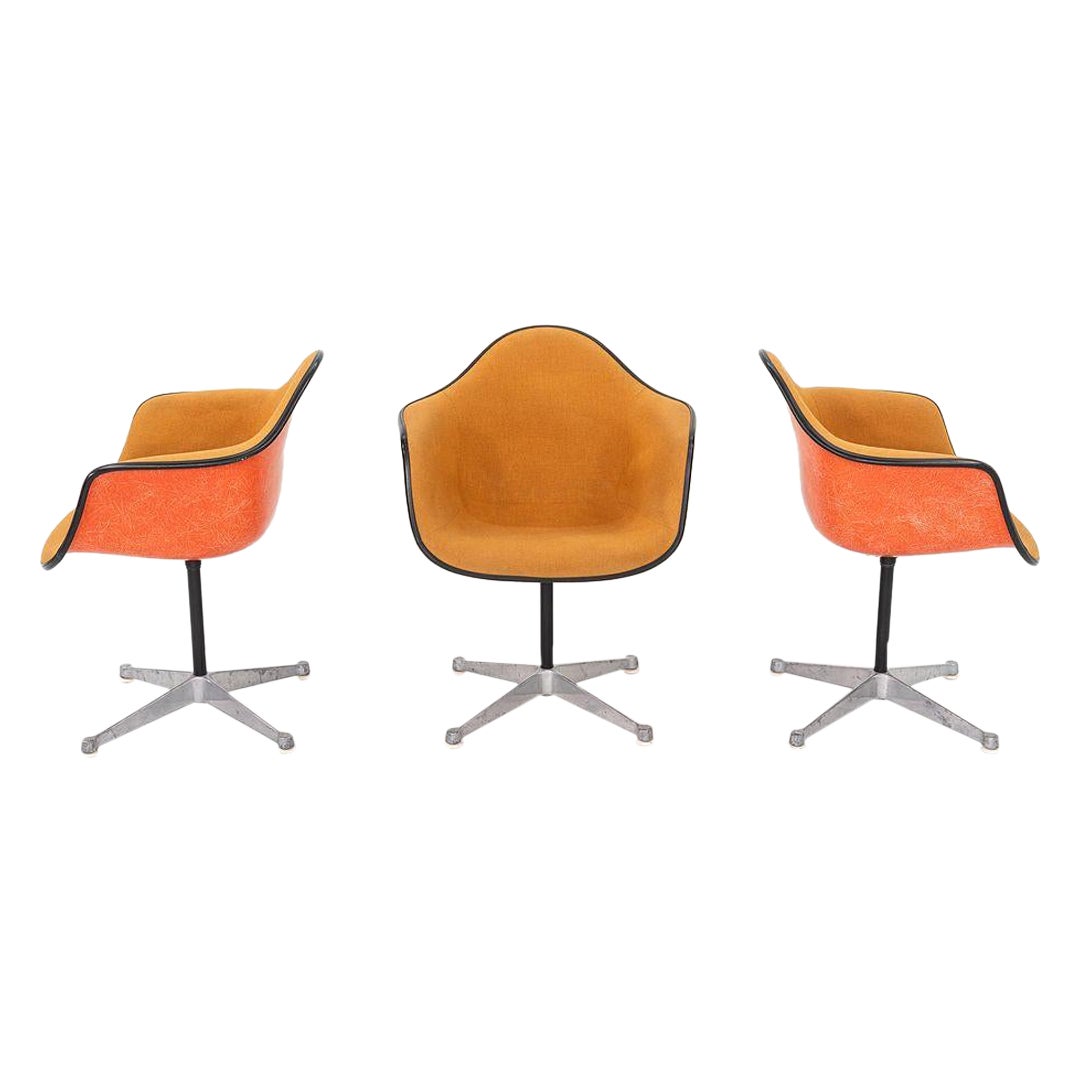 1975 Set of Three Herman Miller Eames Arm Shell Chairs PAC w/ Red/Orange Shells