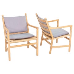 C. 2020 Pareja de tumbonas Hans Wegner para Carl Hansen en roble con cojines