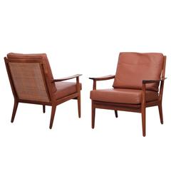 Pair of Danish Rosewood Lounge Chairs in Leather and Cane