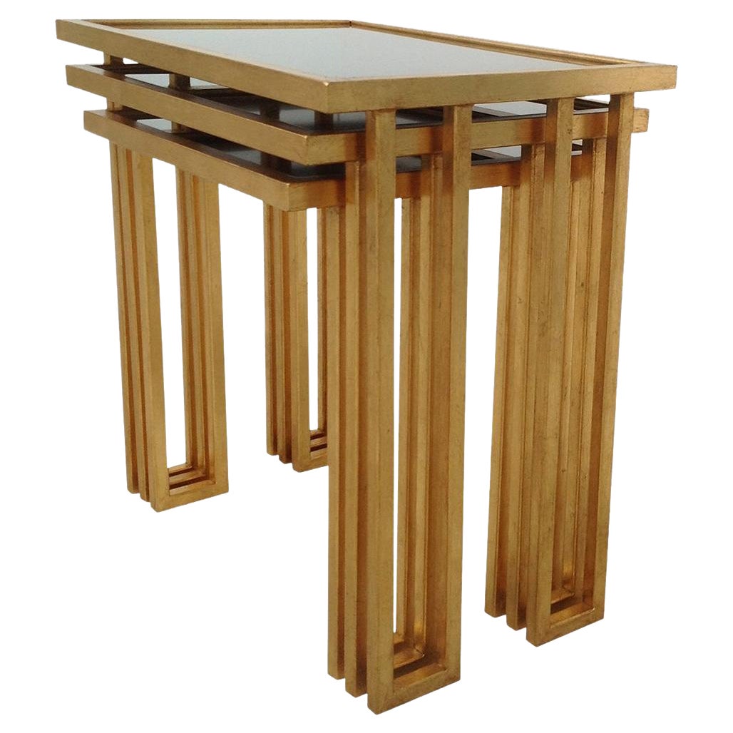 Unique Wrought Iron Nesting Tables in 24 Ct Gold Leaf with Bronze Glass Tops For Sale