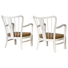 Fritz Hansen paire de fauteuils danois des années 1930 avec peinture blanche mate et peau de mouton