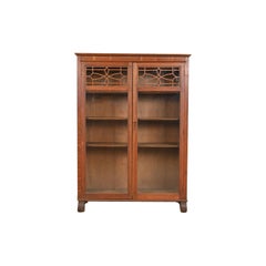 Antigua librería imperio americana de roble tallado con frente de cristal, circa 1890