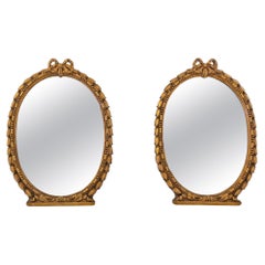 Pair Early 20th Century Small Oval Gilt Composition Wall Mirrors