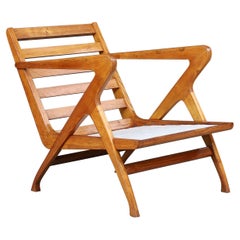 Sculptural Italian Walnut Armchair, 1950s – Mid-Century Modern Design Icon