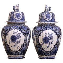 Pair of Blue and White Royal Sphinx Delft Ginger Jars with Foo Dog Lids