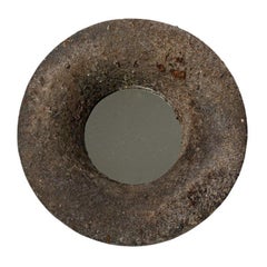 Wood fired ceramic mirror by Mia Jensen, 2025.