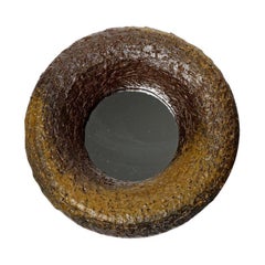 Wood fired ceramic mirror by Mia Jensen, 2025.