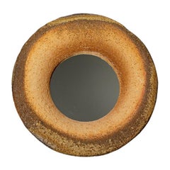 Wood fired ceramic mirror by Mia Jensen, 2025.