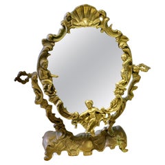 Arts and Crafts Gothic Style Brass Mirror  A classic of its style