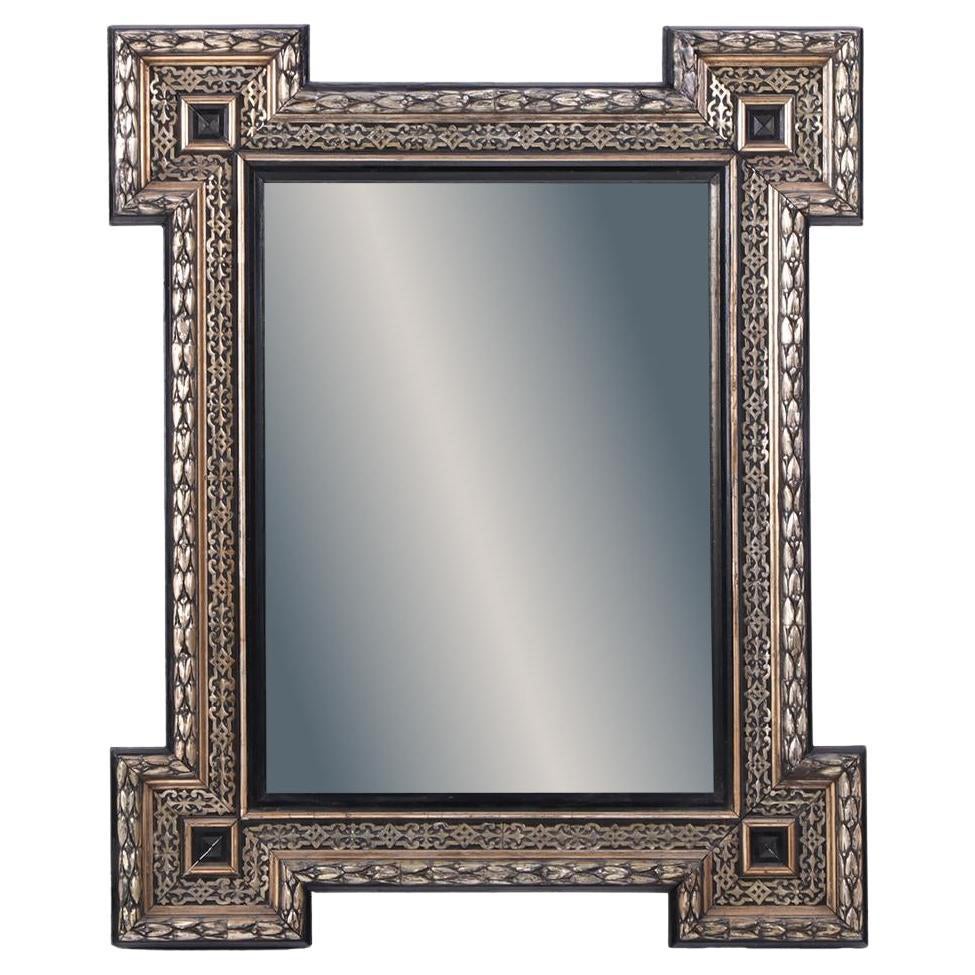 A French Baroque style black silver leaf mirror frame, C. 1890.