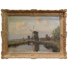Hague School Oil on Canvas Depicting a Windmill Along a Canal, 20th Century