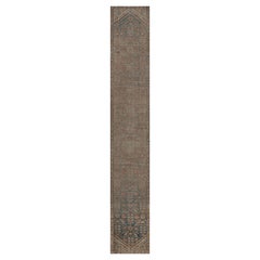 Tapis de couloir persan ancien en laine bleu marine à fleurs tissé à la main