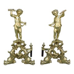 Pair of French Brass Cherub & Dolphin Andirons with Matching Log Stops, C. 1820