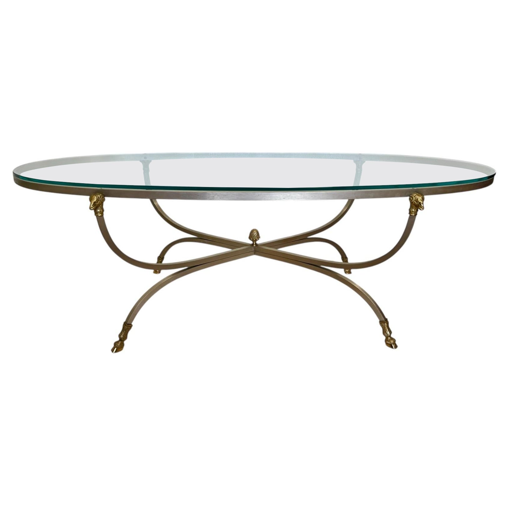 Mesa de centro ovalada italiana de acero y latón con cabeza de carnero, años 60