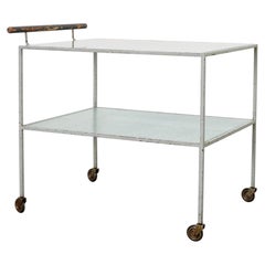 Metz & Co. Chariot de bar en verre et métal gris avec poignée en bois, style Bauhaus
