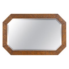 Ancien miroir octogonal en chêne sculpté A.I.C. C.1920