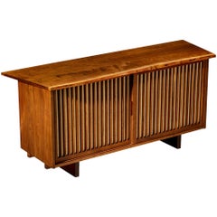 George Nakashima Sliding-Door Cabinet in Walnut and Pandanus Cloth