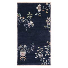 Rug & Kilim’s Chinese Art Deco Style Rug, Navy Blue with Bright Floral Patterns