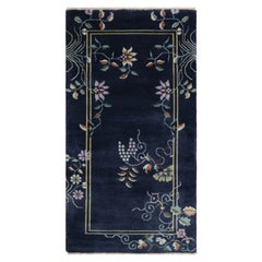 Rug & Kilim’s Chinese Art Deco Style Rug, Bright Floral Patterns over Navy Blue