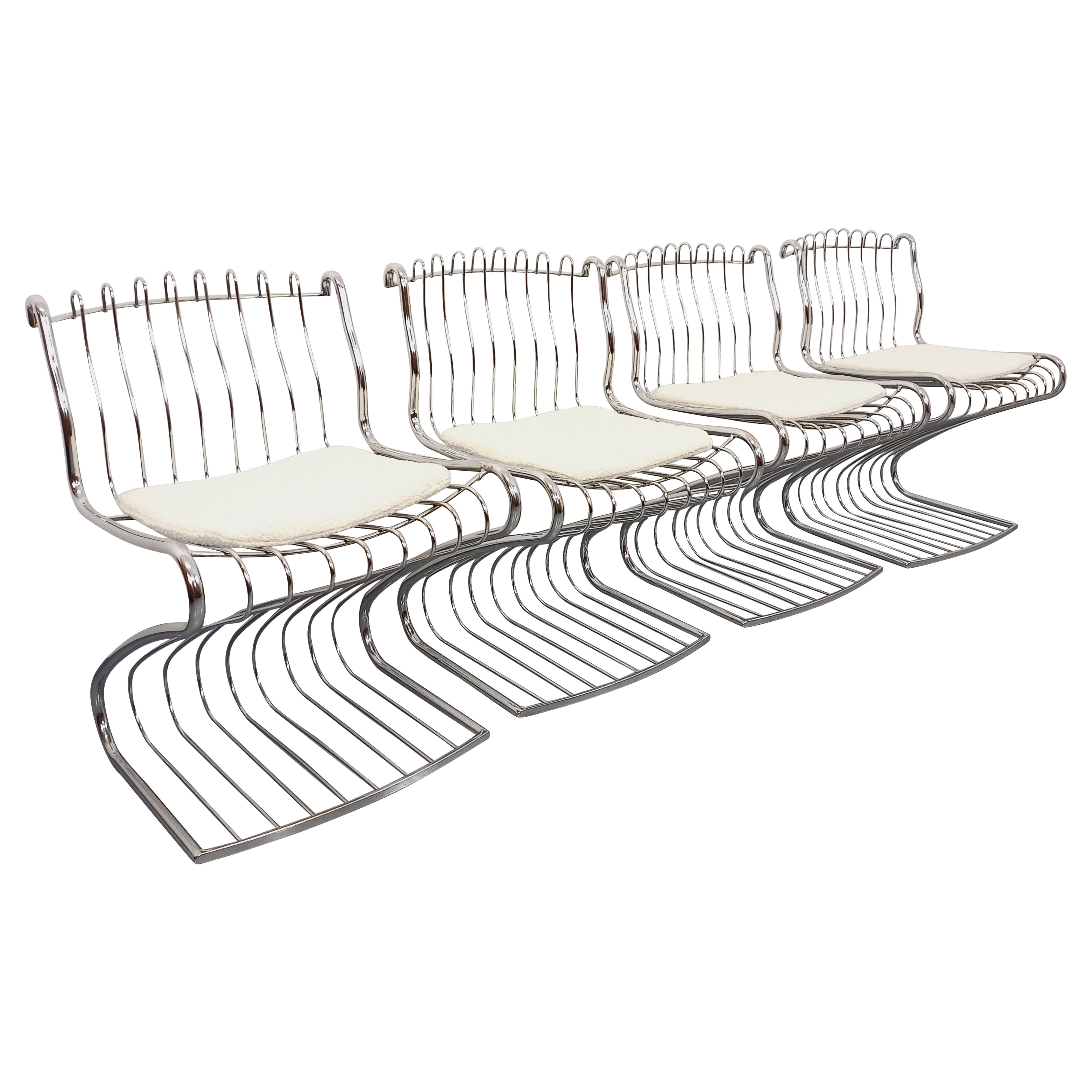 Suite de 4 chaises italiennes vintage Gastone Rinaldi en métal chromé et galette