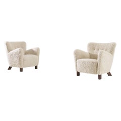 Fritz Hansen Pair of Easy Chairs in Sheepskin, Model 1669