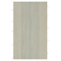 Rug & Kilim’s Contemporary Kilim in White and Light Blue Textural Stripes