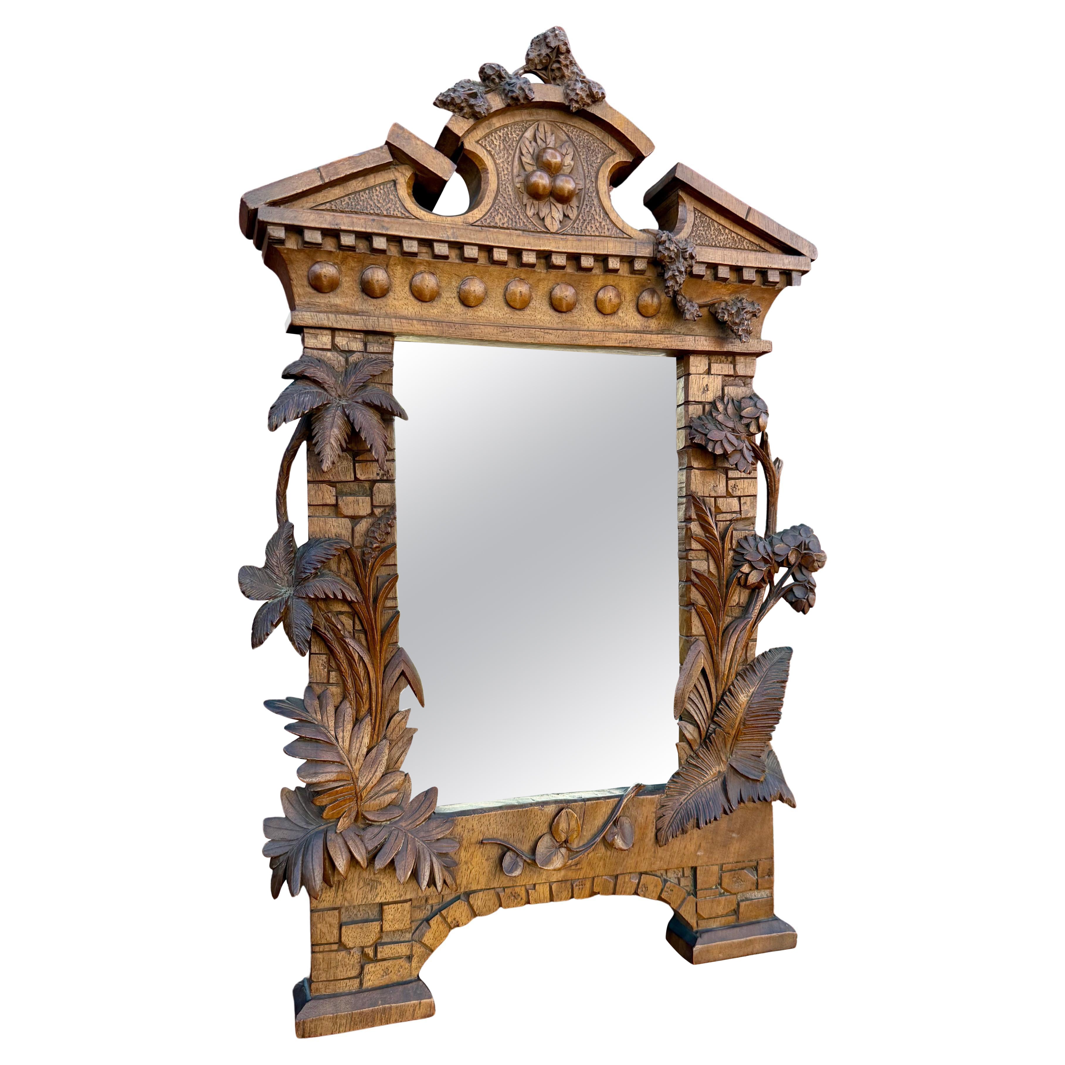 Espejo suizo Black Forest Grand Tour Marco de ruina de templo de madera de nogal tallado a mano S. XIX