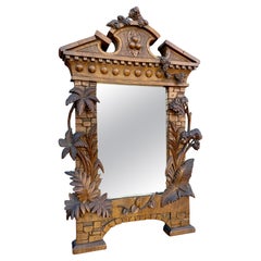 Miroir Grand Tour Suisse Black Forest Cadre de ruine de temple en bois de noyer sculpté à la main 19ème siècle