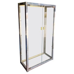 A vintage French glass and chrome curio cabinet / vitrine by Camard, 20th c