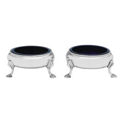 Antique Pair of George III period sterling silver salt cellars with blue glass liners